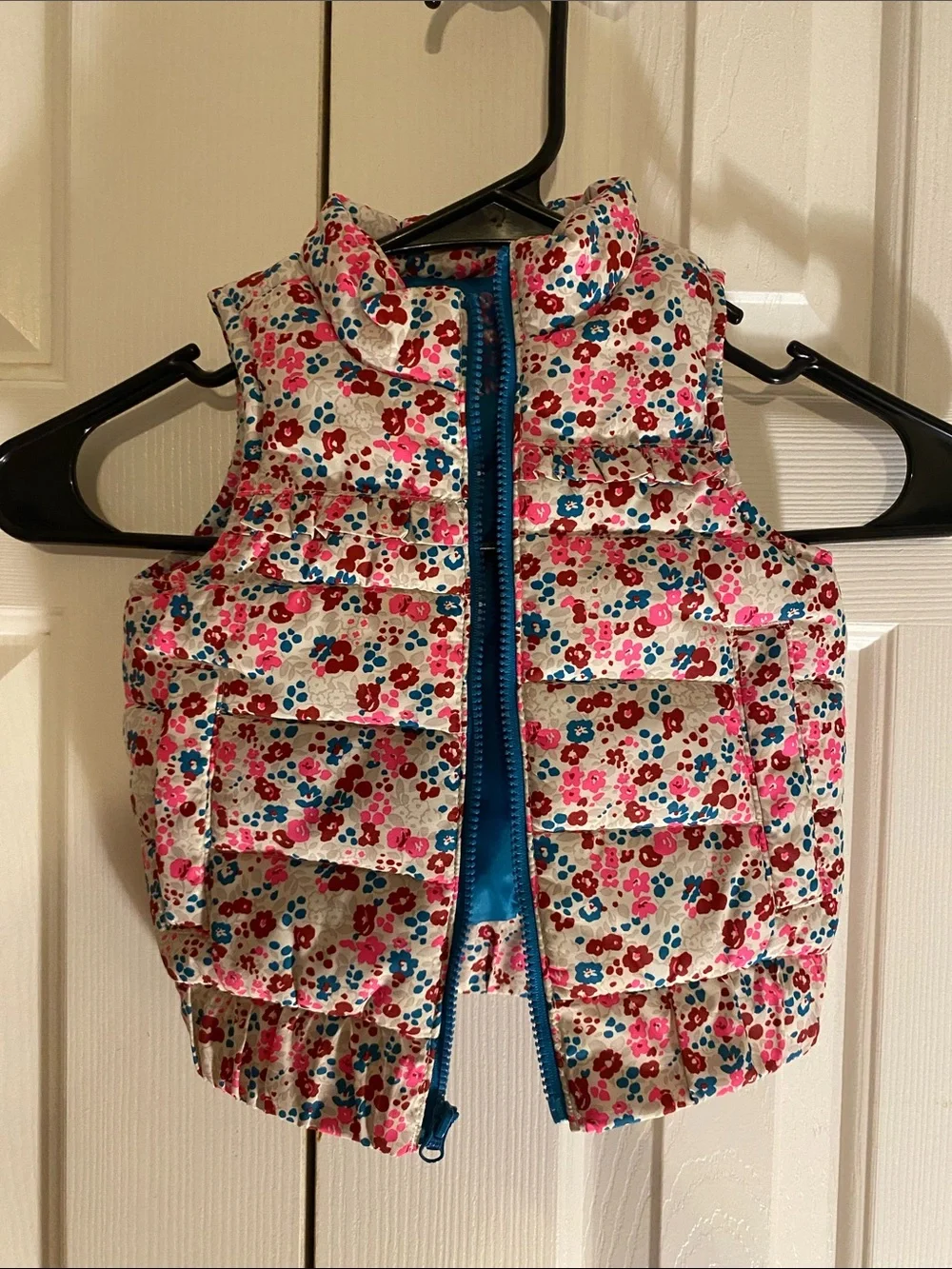 OshKosh B'gosh Floral Lined Puffer Vest in Blue, Pink & Red